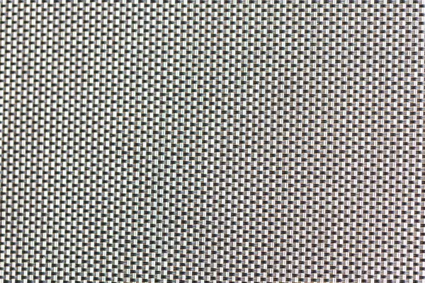 Dokuma kumaşının yakın çekimi. Örgü, beyaz ve koyu iplikler arasında değişiyor..