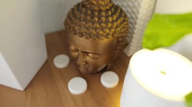 Close-up of the head of the holy Buddha from plaster. High quality 4k footage