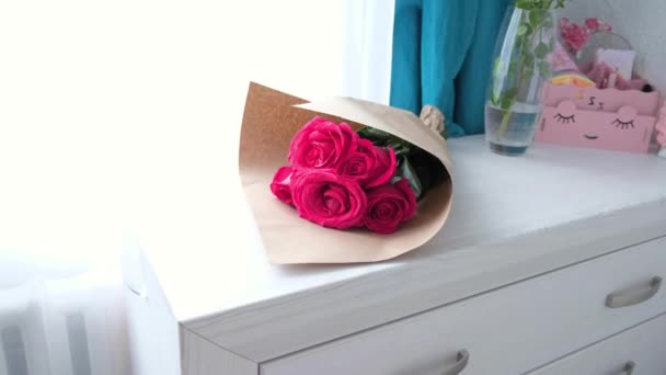 Close Bouquet Pink Roses Wrapped Paper High Quality Footage — Stockvideo