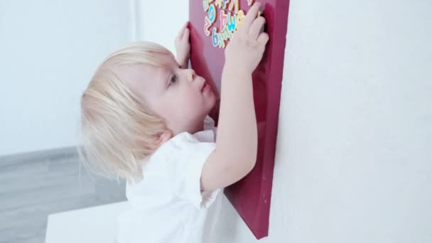 Close Little Boy Playing Numbers Magnetic Board High Quality Footage — Stock Video