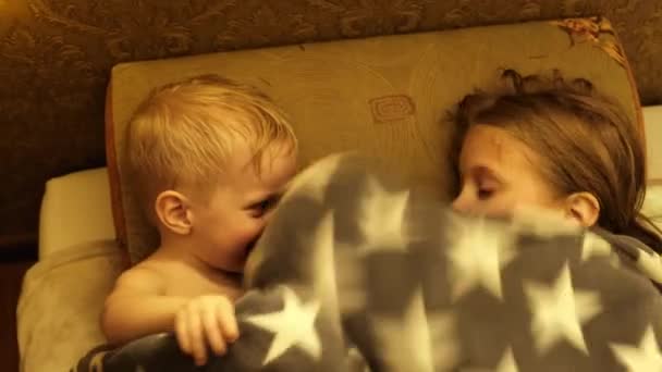 Brother Sister Have Fun Wrapped Blanket High Quality Footage — Stock Video