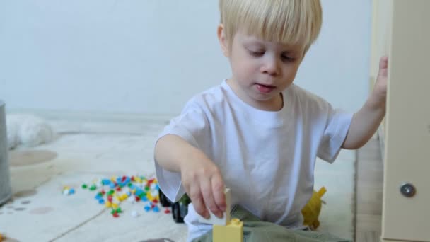 Portrait Little Cute Boy Having Fun Playing Construction Toys Room — Stock Video