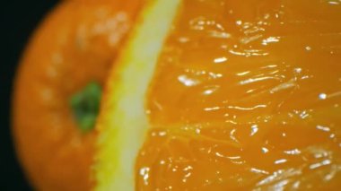 Extreme close up footage of an orange fruit.