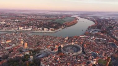 Lyon historical city center and Sane river banks with streets aerial drone video footage. Warm summer day with blue sky. Paris, France