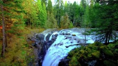 View of Shannon Falls and water rushing down the canyon during a sunny winter day. Located in Squamish, North of Vancouver, British Columbia, Canada