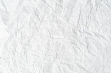 Arkaplan dokusu için büyük kopya alanı kullandıktan sonra kırışık veya buruşuk beyaz şablon kağıdı veya doku kullanılır.