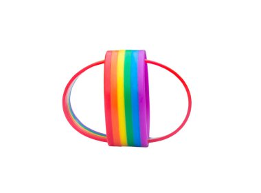 Two colorful rainbow wristband, lgbtq+ people symbol in strange shape are isolated on white background with clipping path. Concept of lgbtq+ wristband wearing to support and attend celebration event of lgbtq+ community on Pride Month of June through 