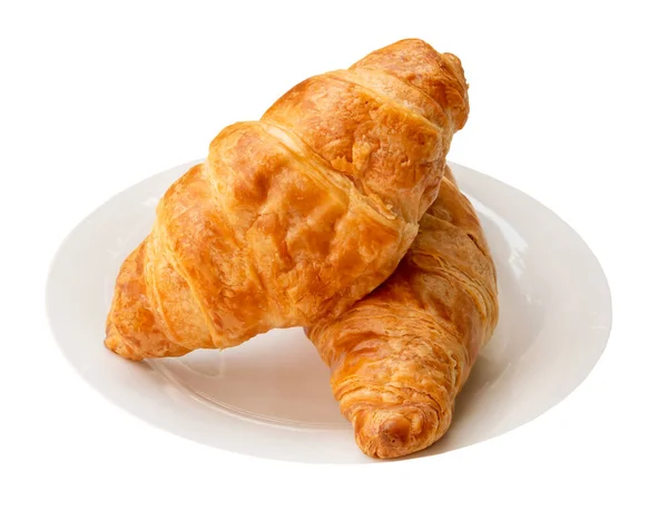 Due Pezzi Croissant Pila Palte Bianche Sono Isolati Sfondo Bianco — Foto Stock