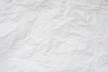 Dekoratif sanat eserlerinde arka plan dokusu için geniş kopya alanı olan tuvalet veya tuvalette kullanıldıktan sonra buruşmuş veya buruşmuş beyaz şablon kağıdı veya doku kullanılır..