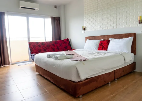 Luxurious and beautiful bed or mattress in hotel or resort room is clean and tidy prepared for guests.