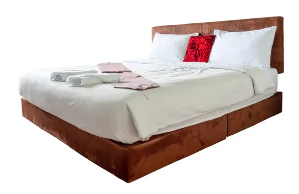 Luxurious and beautiful bed or mattress in hotel or resort room keeping clean and tidy prepared for guests is isolated on white background with clipping path..