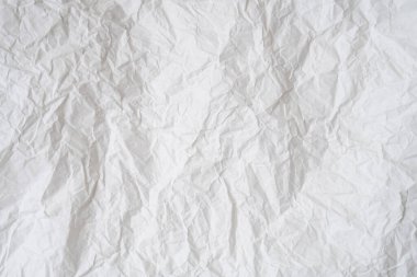 Dekoratif sanat eserlerinde arka plan dokusu için geniş kopya alanı olan tuvalet veya tuvalette kullanıldıktan sonra buruşmuş veya buruşmuş beyaz şablon kağıdı veya doku kullanılır..