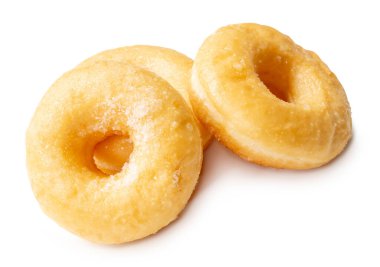 Üç lezzetli Tarçın Şekerli Mini Donut 'ın üst görüntüsü kırpma yolu ile beyaz arka planda izole edilmiştir..