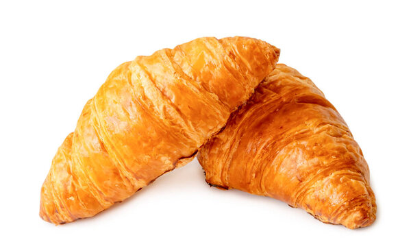 two piece of croissant in stack and cross shape are isolated on white background with clipping path