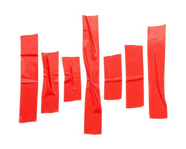 Üst görünüm kırmızı yapıştırıcı bant veya bez bant şeritleri kırpma yolu ile beyaz arkaplanda izole edilir.