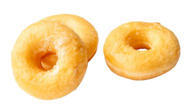 Üç lezzetli Tarçın Şekerli Mini Donut 'ın ön plan seti kesme yolu ile beyaz arka planda izole edilmiştir. Şekerli çörekler.