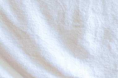 Wrinkled white towel texture with wave pattern is used as clothing texture in decorative art work. clipart