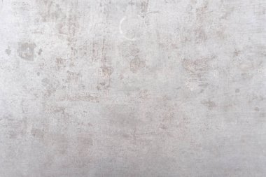 Old dirty grey concrete background texture is used in decorative art work. Gray concrete wall texture with strange pattern and stripes