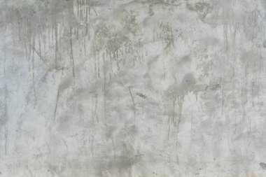 Old dirty grey concrete background texture is used in decorative art work. Gray concrete wall texture with strange pattern and stripes