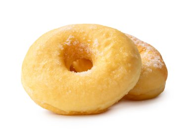 Esmer şeker kaplı tarçınlı çörekler beyaz arka planda kırpma yolu ile izole edilir.