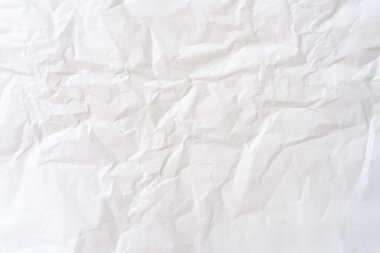 Beyaz buruşuk kağıt dokunun üst görünümü beyaz buruşuk kağıt arkaplan dokusu olarak kullanılır.
