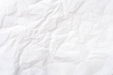 Üst görünüm ve buruşuk beyaz şablon kağıt dokusu dekoratif sanat çalışmalarında kırışık veya buruşuk beyaz kağıt arkaplan dokusu için kullanılır..