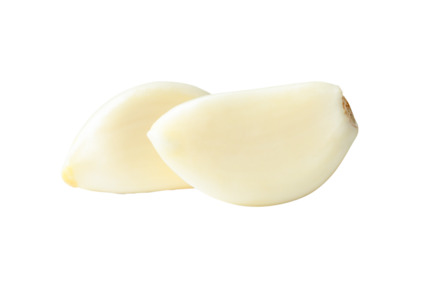 Side view of peeled garlic cloves in stack is isolated with clipping path in png file format.