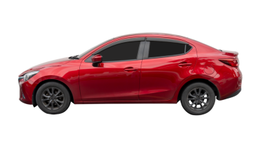 Kırmızı spor sedan aracın yan görünümü png dosya biçiminde kırpma yolu ile izole edilmiştir.