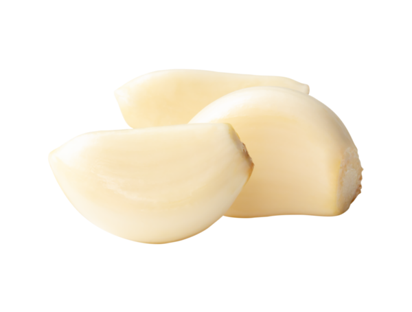 Side view of peeled pounded garlic cloves or pieces in stack is isolated with clipping path in png file format.