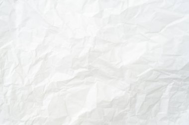 Üst görünüm ve buruşmuş beyaz kağıt dokusu dekoratif sanat eserlerinde buruşmuş beyaz kağıt arkaplan dokusu olarak kullanılır..