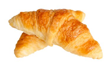 Çapraz biçimli iki kahverengi veya altın kruvasan üst görünümü kırpma yolu ile beyaz arka planda izole edilir.