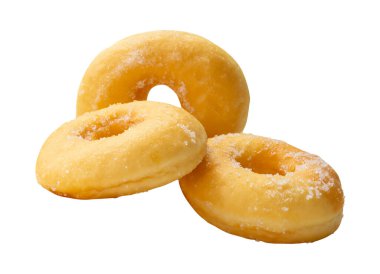 Yığındaki kahverengi şekerli tarçınlı çöreklerin yan görünümü kırpma yolu ile beyaz arkaplanda izole edilmiştir..