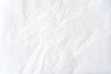 Üst görünüm ve buruşmuş beyaz kağıt dokusu dekoratif sanat eserlerinde buruşmuş beyaz kağıt arkaplan dokusu olarak kullanılır..