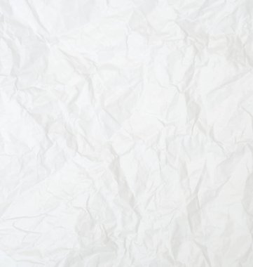 Üst görünüm ve buruşmuş beyaz kağıt dokusu dekoratif sanat eserlerinde buruşmuş beyaz kağıt arkaplan dokusu olarak kullanılır..