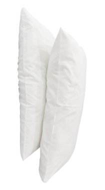 Üst üste kullanımdan sonra iki beyaz yastık kırpma yolu ile beyaz arkaplanda izole edilir.