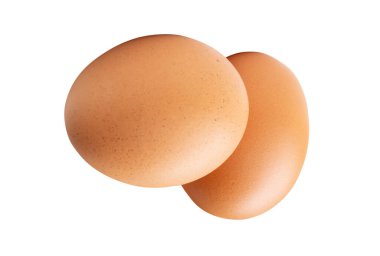 Yığındaki iki taze kahverengi tavuk yumurtasının üst görüntüsü kırpma yolu ile beyaz arka planda izole edilmiştir..