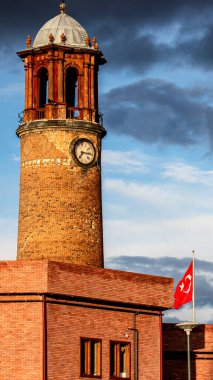 Erzurum Kalesi Saat Kulesi or Castle Clock Tower and Turkish flag, vertical wallpaper symbolizing national pride and historical legacy. clipart