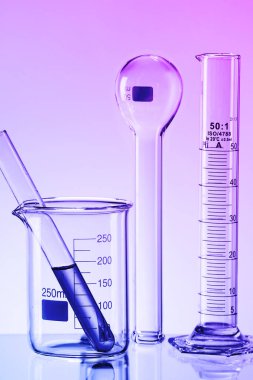 Laboratory Research concept. Scientific laboratory glassware with colourful liquid.