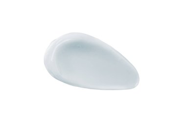Face cream smear isolated on white background. White lotion swatch. Abstract cosmetic cream texture.