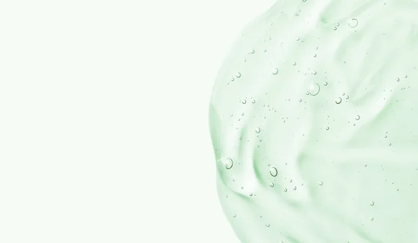 Serumgel Abstrich Auf Grünem Hintergrund Kosmetische Transparente Gelserum Textur — Stockfoto