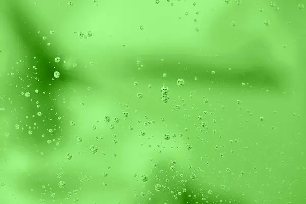 Gotas Agua Sobre Fondo Verde Burbujas Agua Abstracta Vidrio Sobre — Foto de Stock