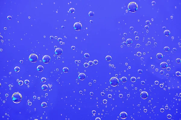 Fondo Burbujas Agua Macro Burbujas Oxígeno Agua Sobre Fondo Azul —  Fotos de Stock