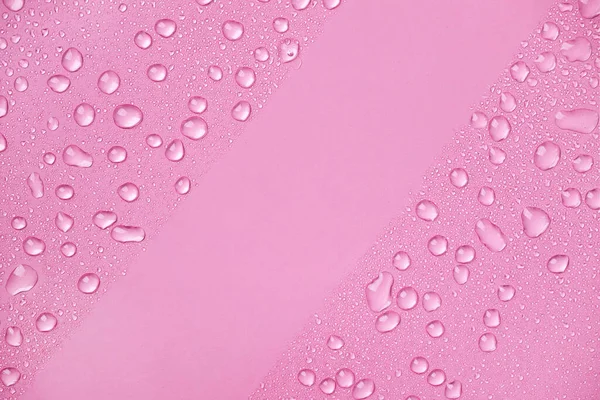 Νερό Σταγόνες Ροζ Φόντο Πάνω Όψη Καλλυντικές Ενυδατικές Υγρές Σταγόνες — Φωτογραφία Αρχείου