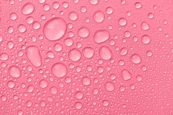 Gotas Agua Sobre Fondo Rosa Vista Superior Gotas Líquidas Hidratantes —  Fotos de Stock