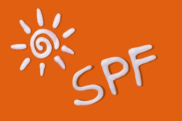 Spf Kräm Solkräm Solform Orange Bakgrund Kreativ Idé Solkräm Begreppet — Stockfoto
