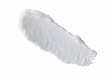 Beyaz arka planda beyaz krem lekesi var. Soyut kozmetik ürün dokusu. Yüz kremi ya da şampuan, tasarım için vücut losyonu örneği.