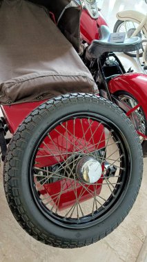 the spare spoke wheel is located at the rear of the vehicle