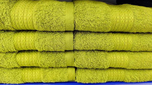 Pile of Green Towel at factory outlet