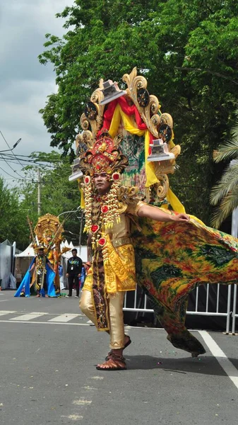 stock image Banjarmasin, South Kalimantan, Indonesia - October 01, 2022 : Dayak and sasirangan fashion performed during a cultural fashion festival carnival held by the provincial government of South Kalimantan