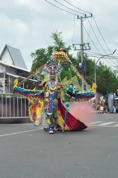 stock image Banjarmasin, South Kalimantan, Indonesia - October 01, 2022 : Dayak and sasirangan fashion performed during a cultural fashion festival carnival held by the provincial government of South Kalimantan